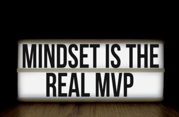 Motivational message 'Mindset is the Real MVP' displayed on a lightbox with black background.